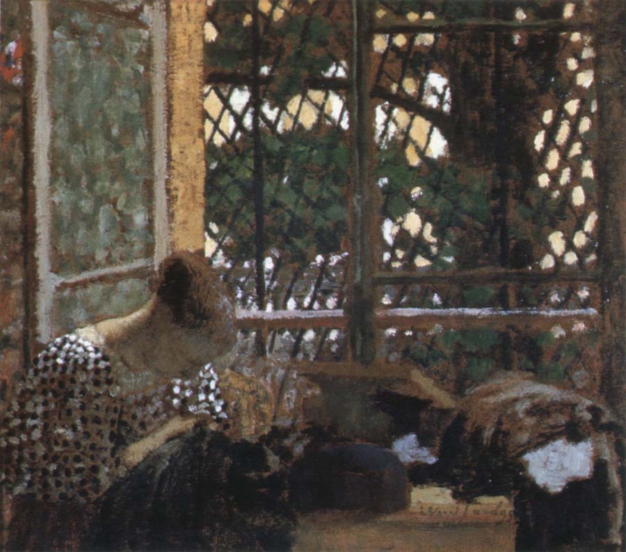 woman sewing before a garden
